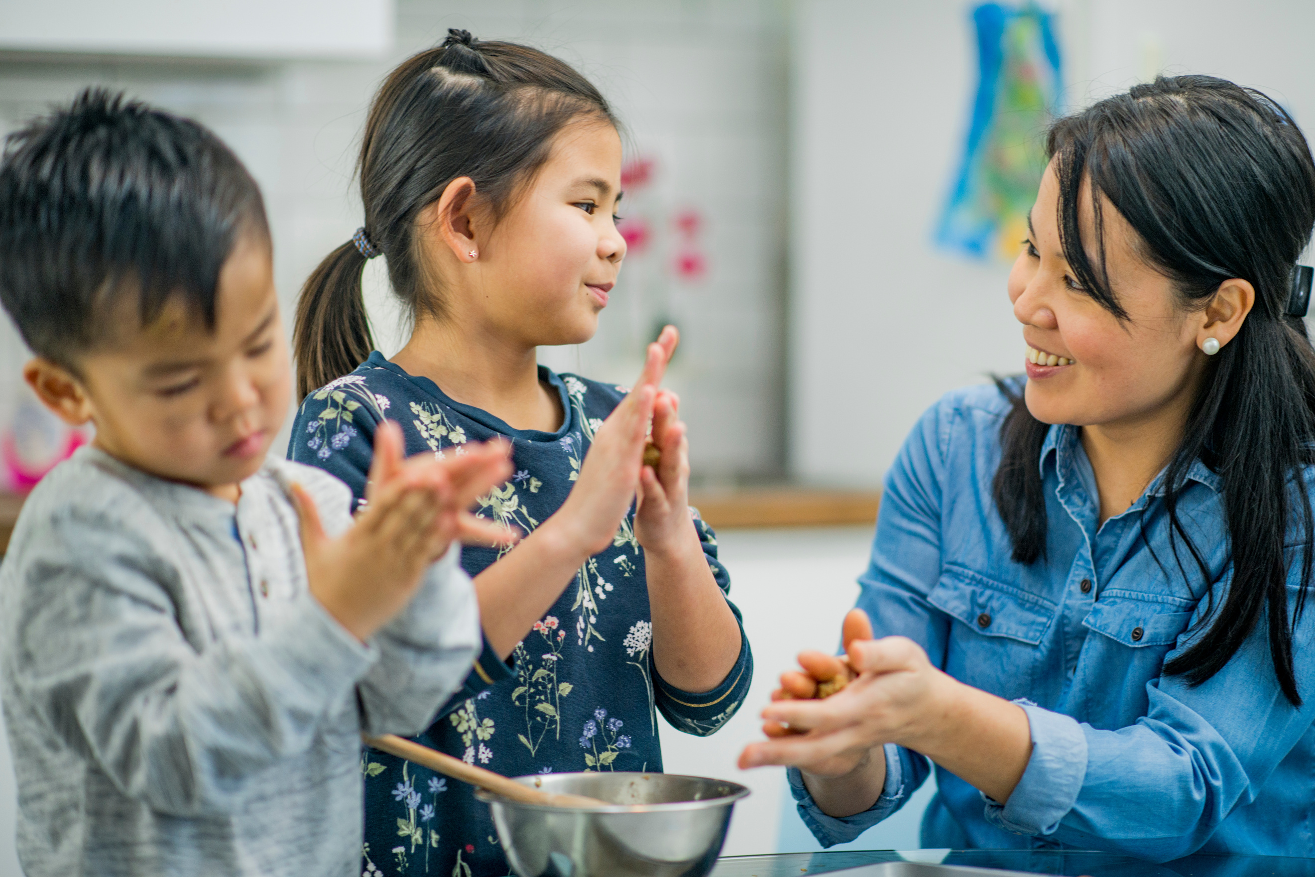 Kids baking with mom